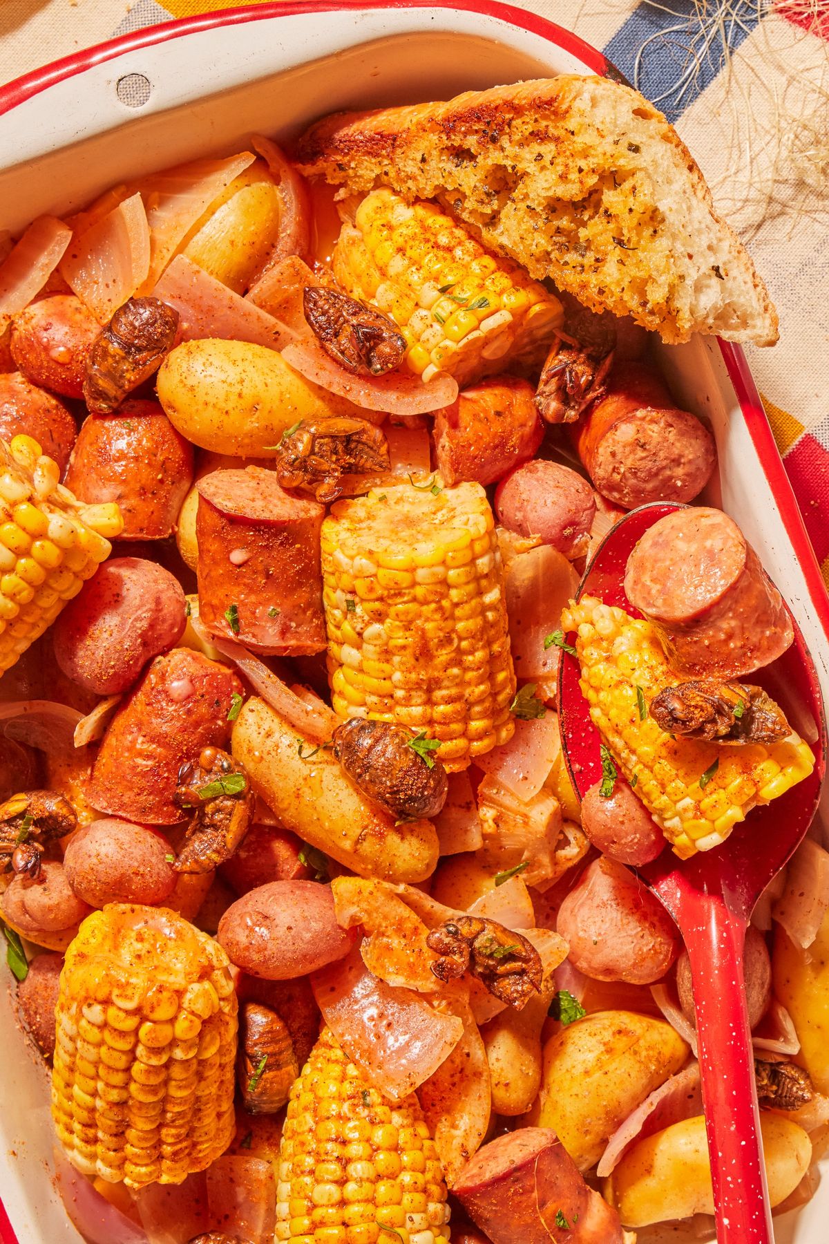 A Cook County boil of corn, potatoes, sausage and cicadas